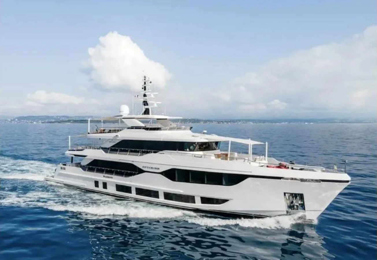 a white yacht in the water aboard OPTIMISM Yacht for Sale