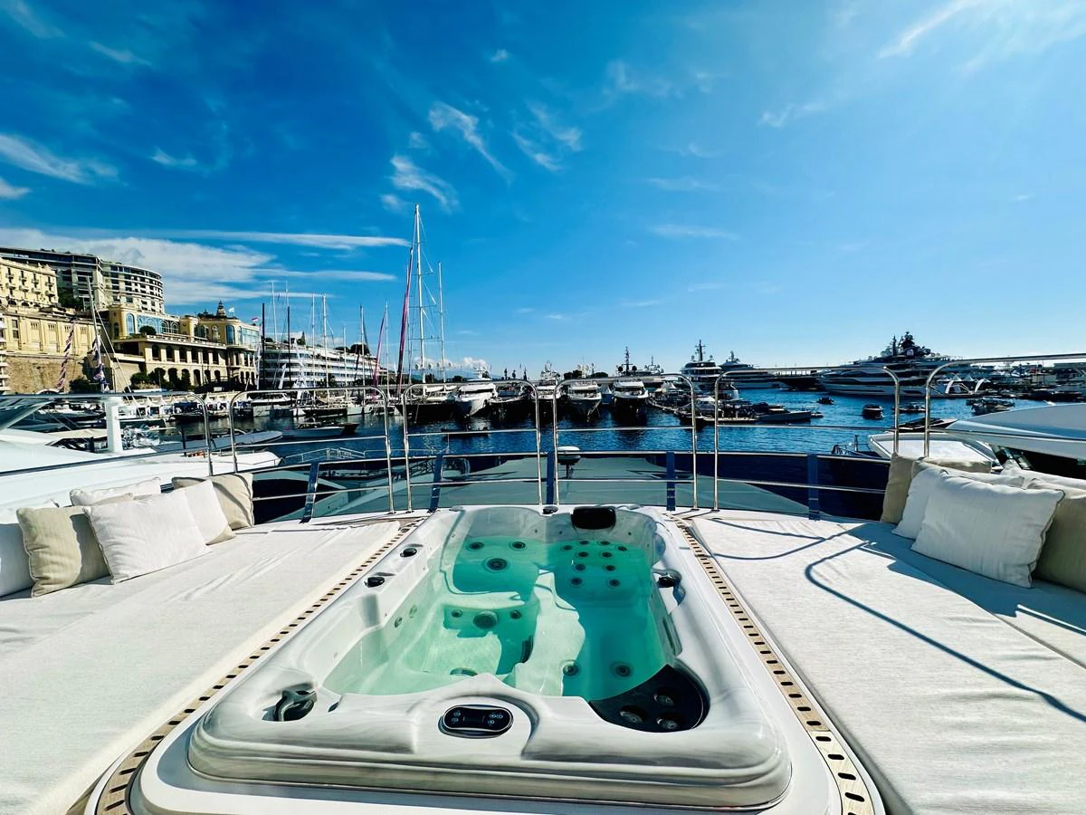a pool with a water slide aboard OPTIMISM Yacht for Sale