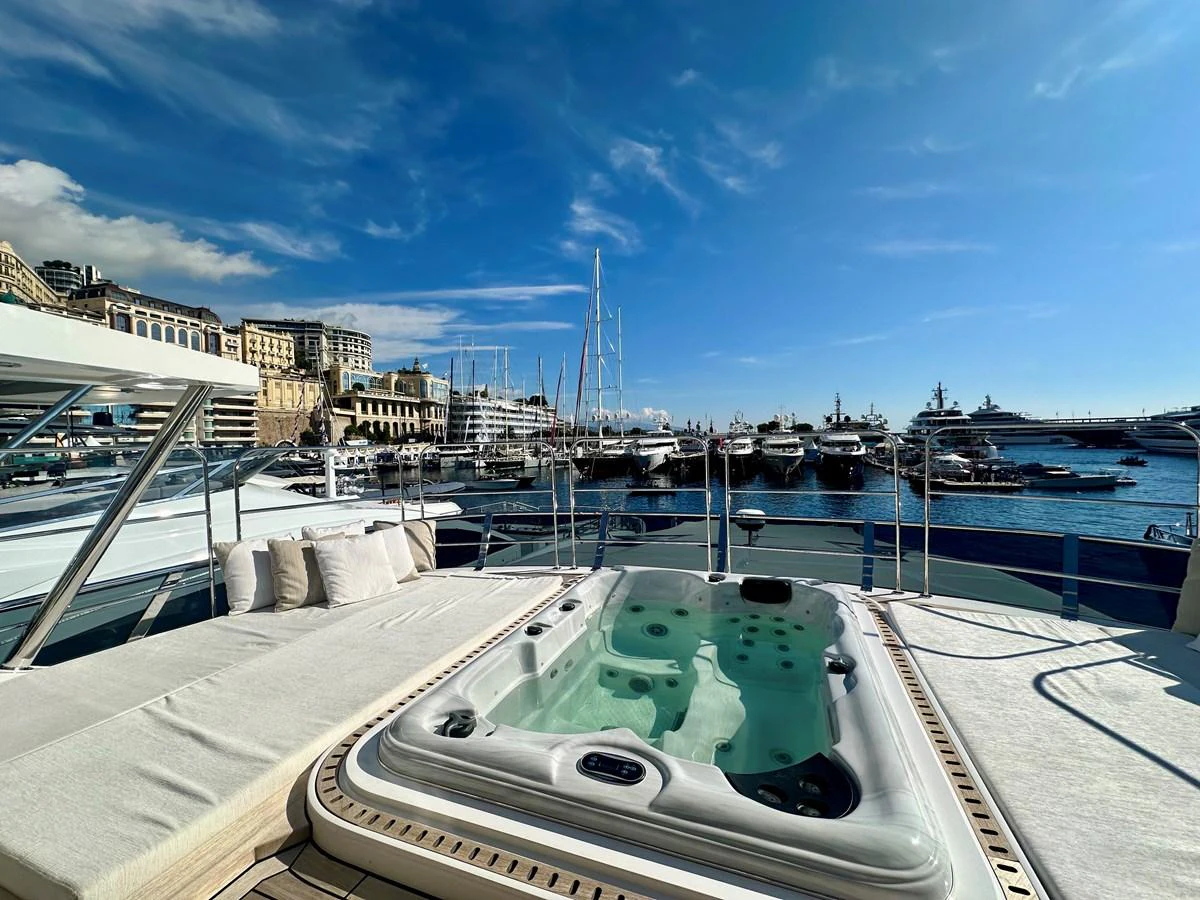 a pool on a rooftop aboard OPTIMISM Yacht for Sale