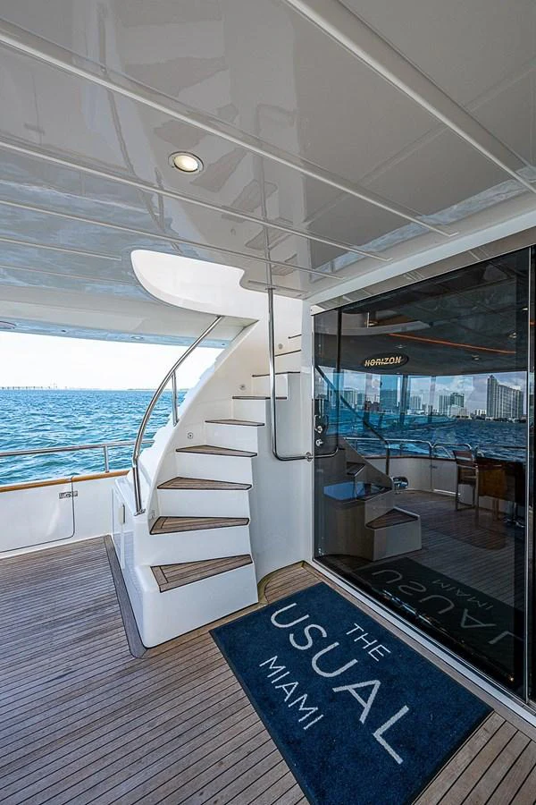 a staircase leading to a pool aboard THE USUAL Yacht for Sale