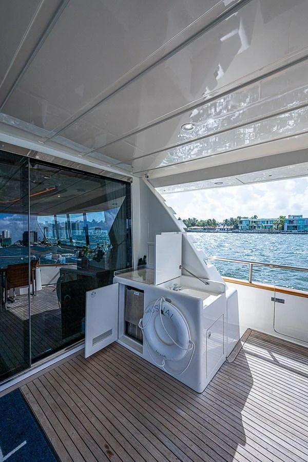 a room with a large fan aboard THE USUAL Yacht for Sale