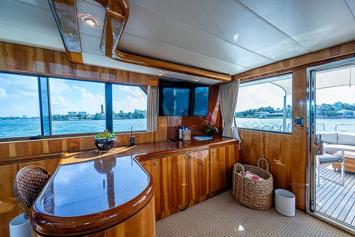a large kitchen with a large window aboard THE USUAL Yacht for Sale