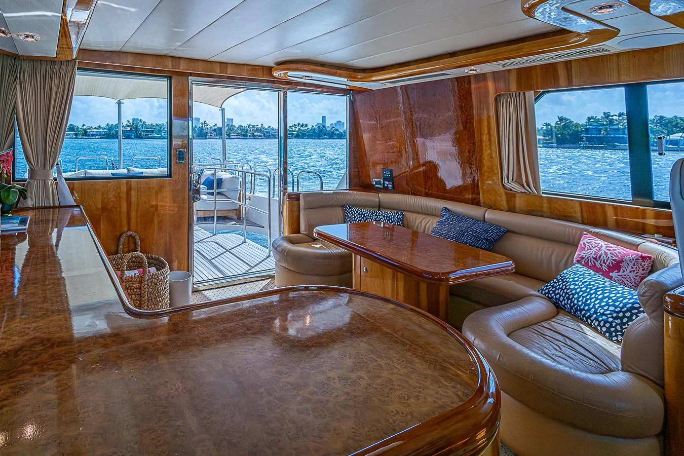 a living room with a large window aboard THE USUAL Yacht for Sale