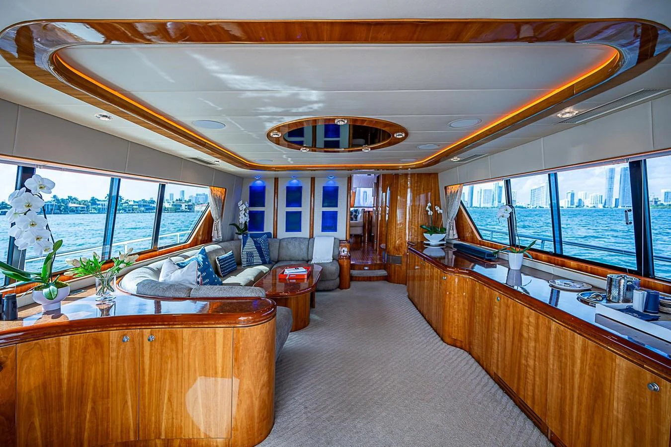 a room with a large window and a bed aboard THE USUAL Yacht for Sale