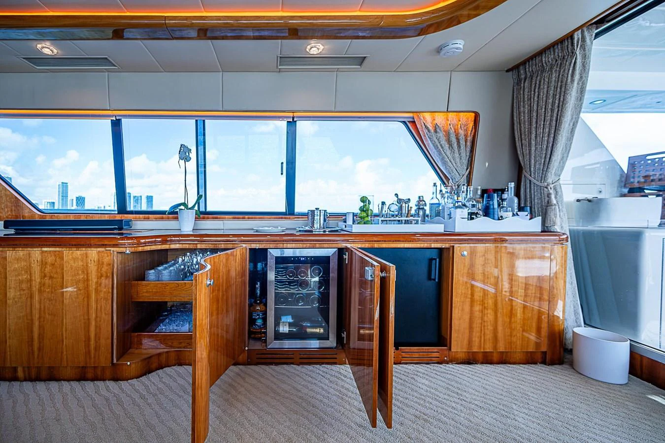 a kitchen with a wood floor aboard THE USUAL Yacht for Sale