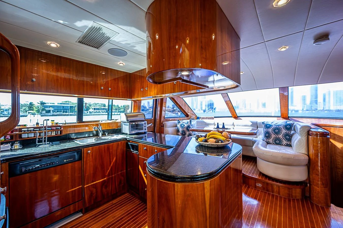 a kitchen with a large island aboard THE USUAL Yacht for Sale