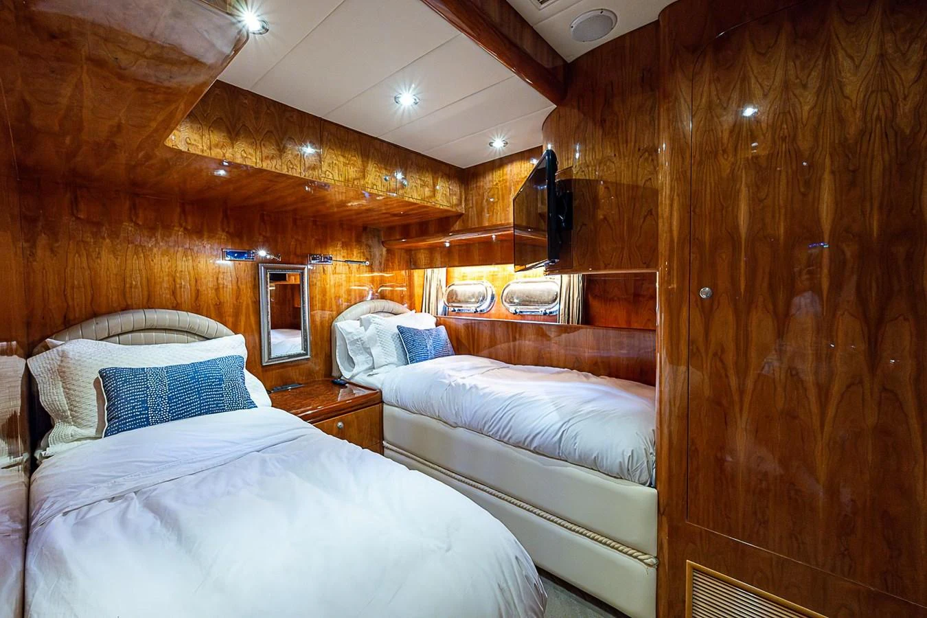 a room with two beds aboard THE USUAL Yacht for Sale