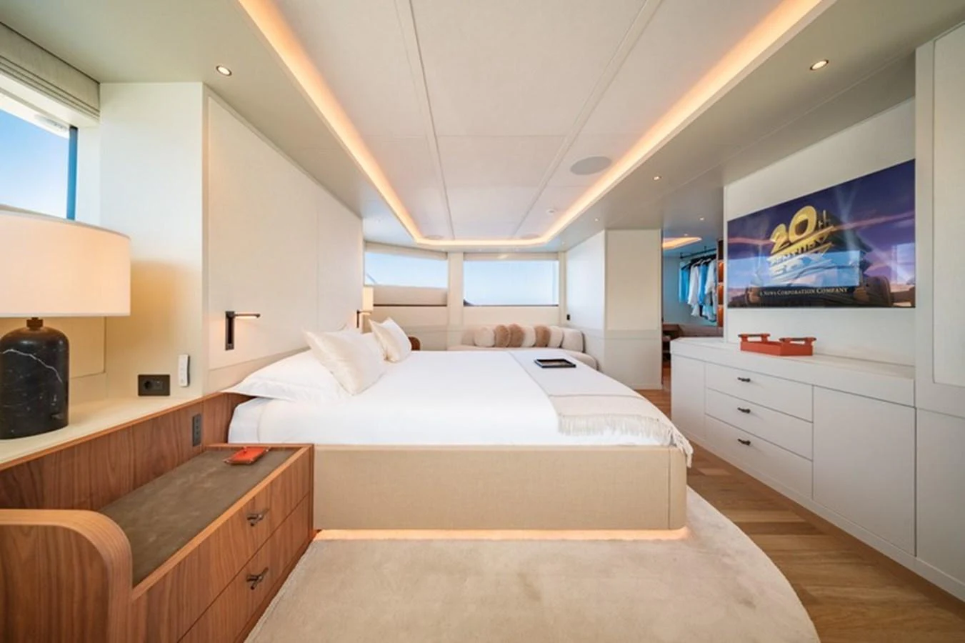 a bedroom with a large bed aboard COCOON Yacht for Sale