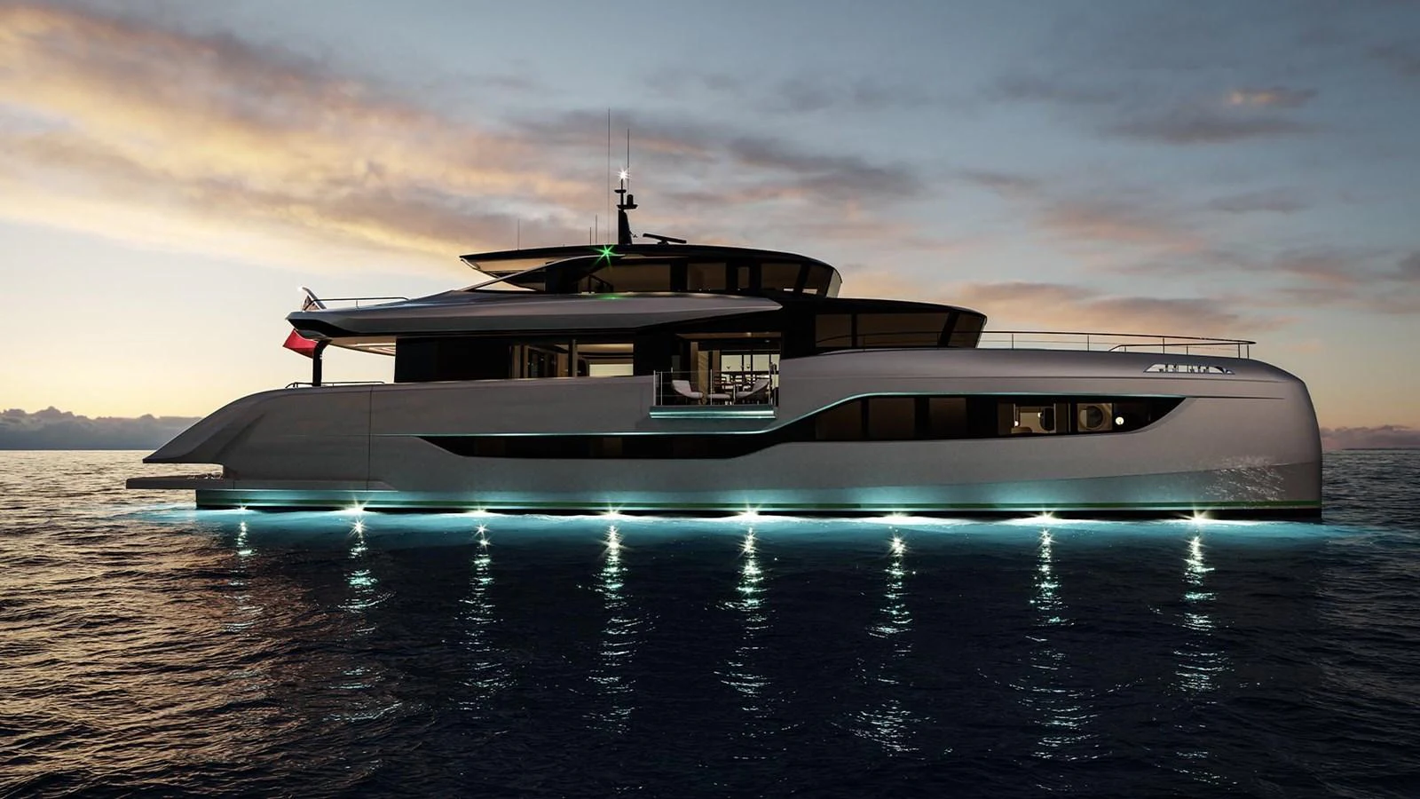 A sleek and modern yacht is illuminated against a serene sunset backdrop on the water. aboard ULTIMA 111 Yacht for Sale
