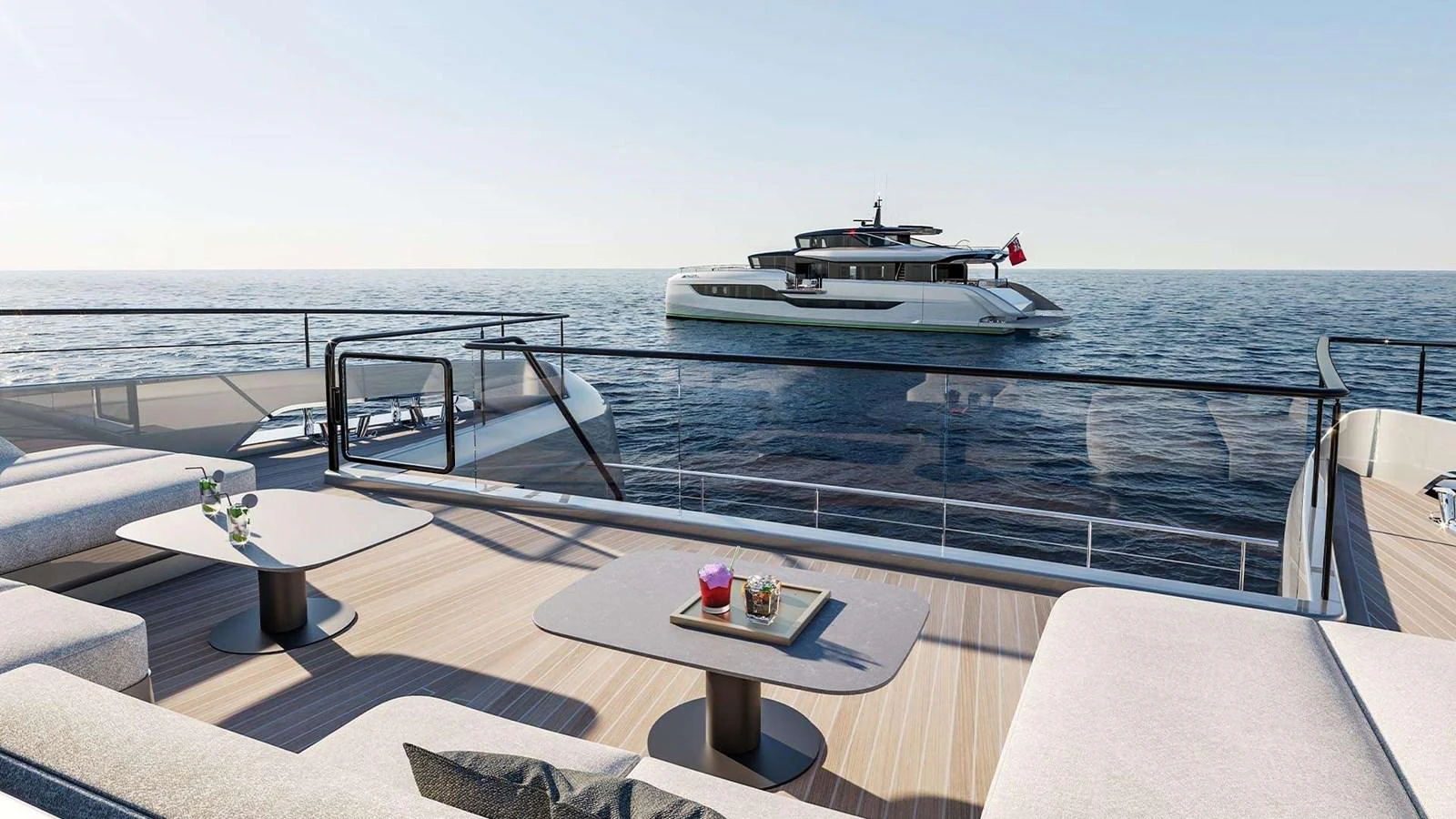 The image captures a luxurious yacht on the water, viewed from the aft deck of another yacht, showcasing a serene and elegant setting. aboard ULTIMA 111 Yacht for Sale