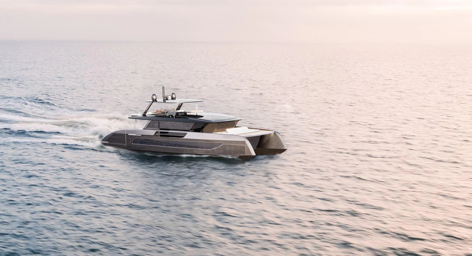A sleek, modern yacht glides smoothly across calm waters at sunset. aboard ULTIMA 88 Yacht for Sale