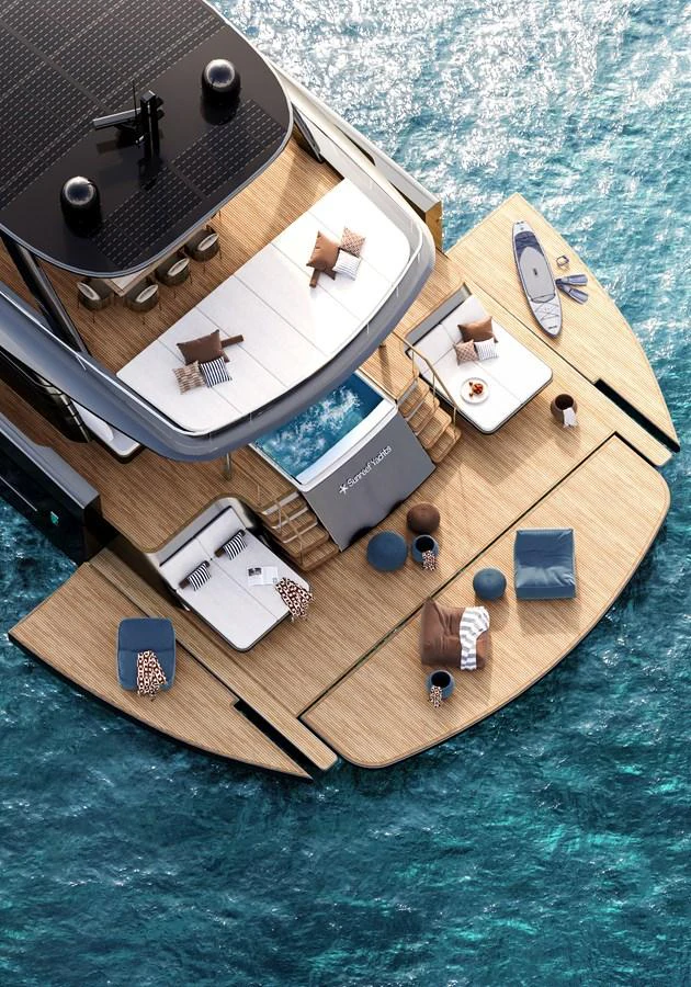 The aft deck of the yacht features luxurious lounging areas with a stunning view of the water. aboard ULTIMA 88 Yacht for Sale