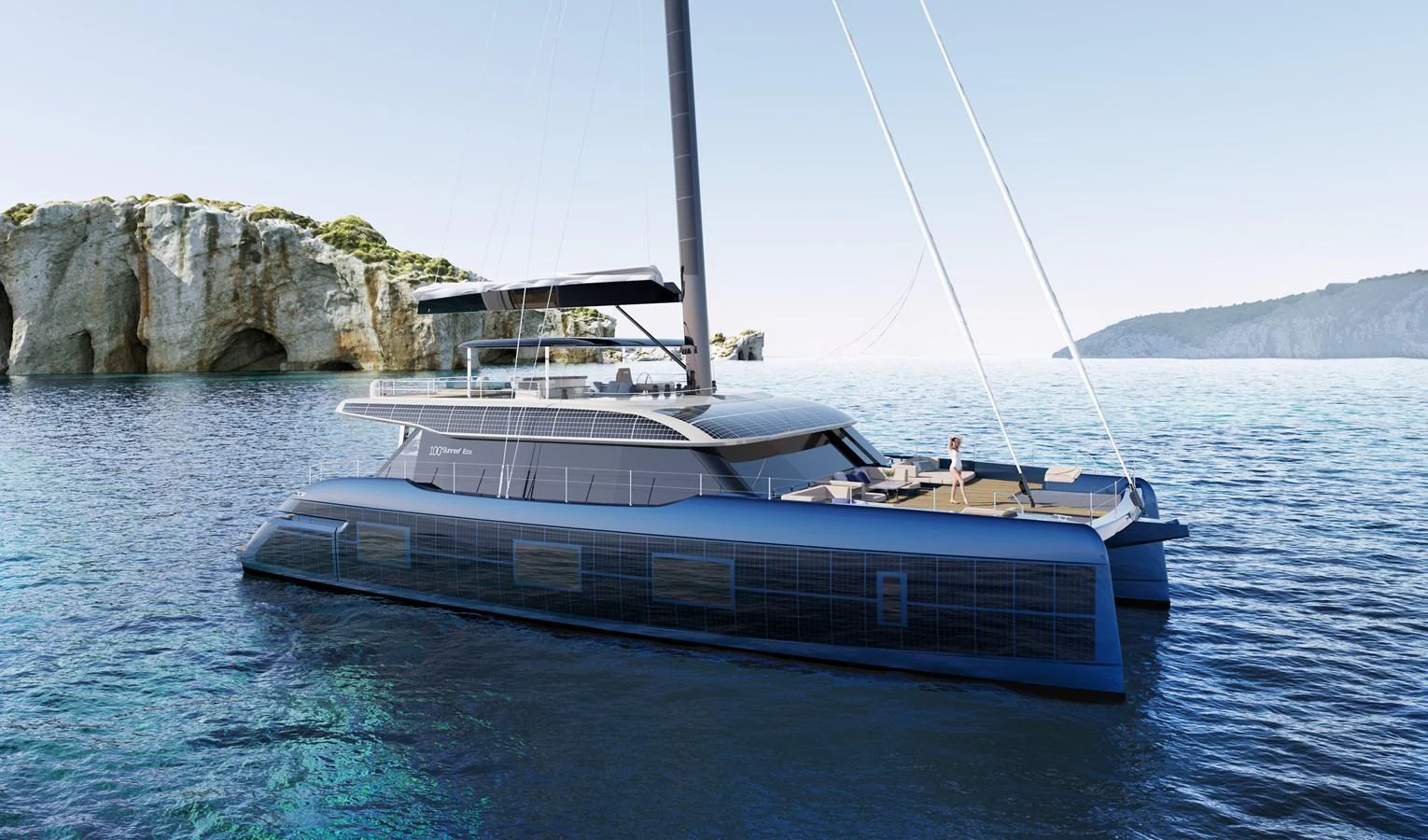 A sleek and modern catamaran yacht glides gracefully on serene blue waters with a picturesque rocky coastline in the background. aboard SUNREEF 100 NEXT Yacht for Sale