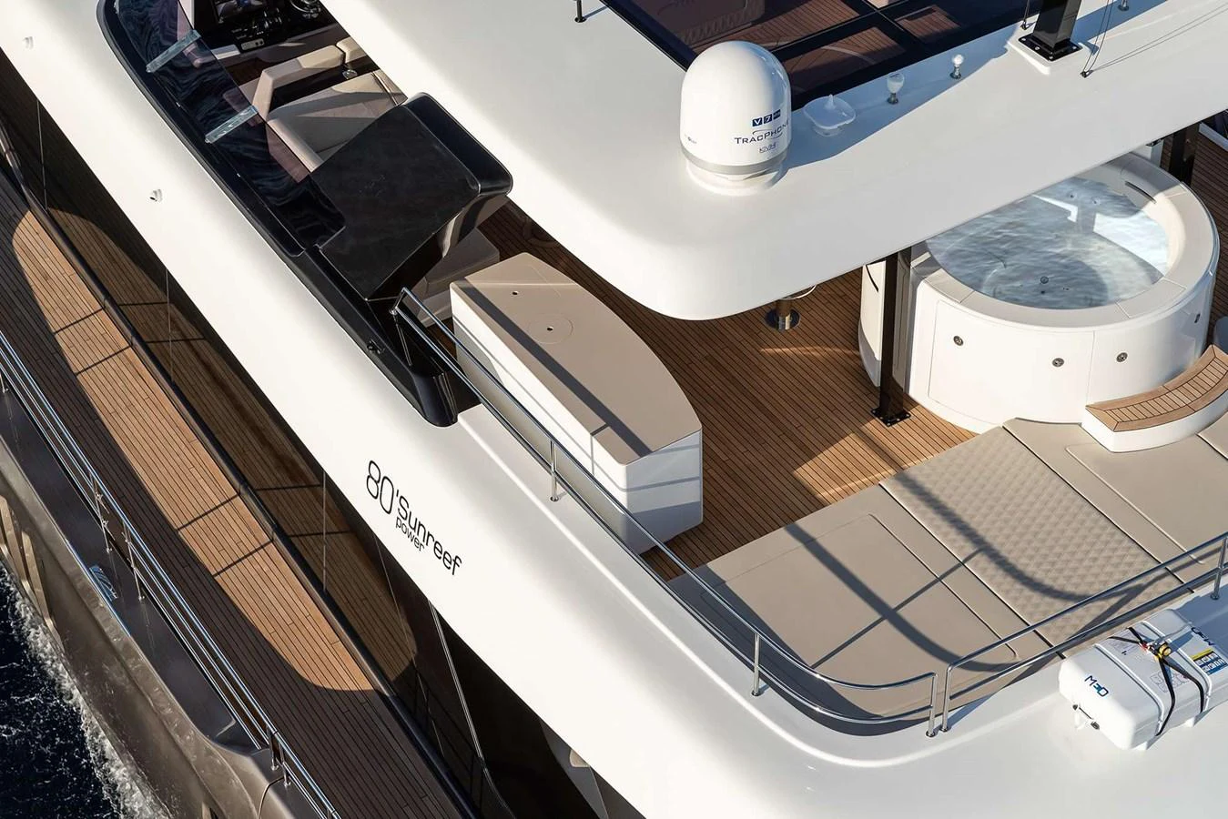 The upper deck of the yacht features a luxurious hot tub and ample seating area for relaxation. aboard 80 SUNREEF POWER NEXT Yacht for Sale