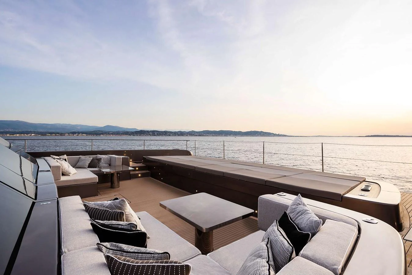 The aft deck offers a spacious and luxurious lounging area with stunning ocean views. aboard 80 SUNREEF POWER NEXT Yacht for Sale