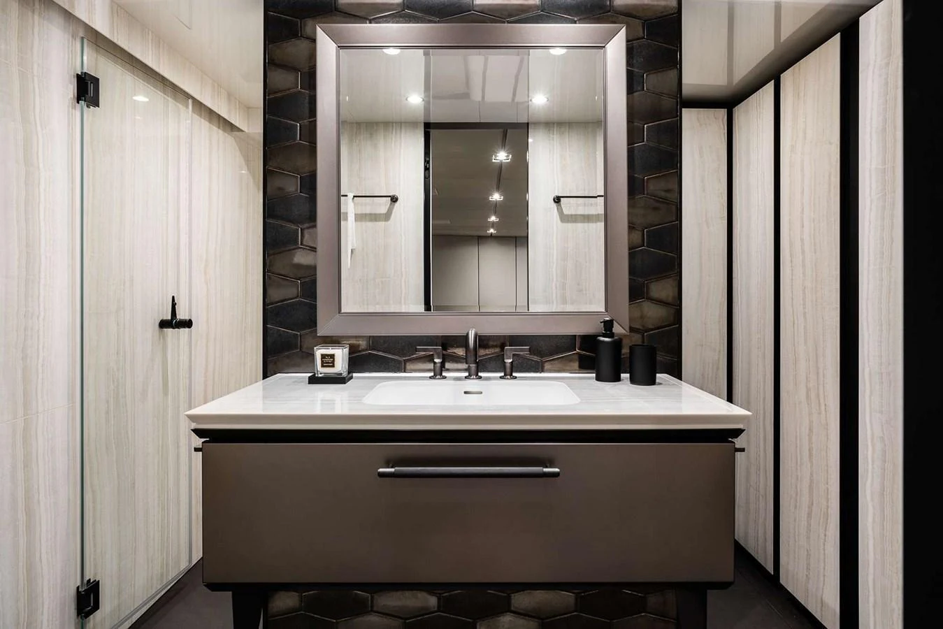 A modern yacht bathroom featuring sleek fixtures and contemporary design. aboard 80 SUNREEF POWER NEXT Yacht for Sale