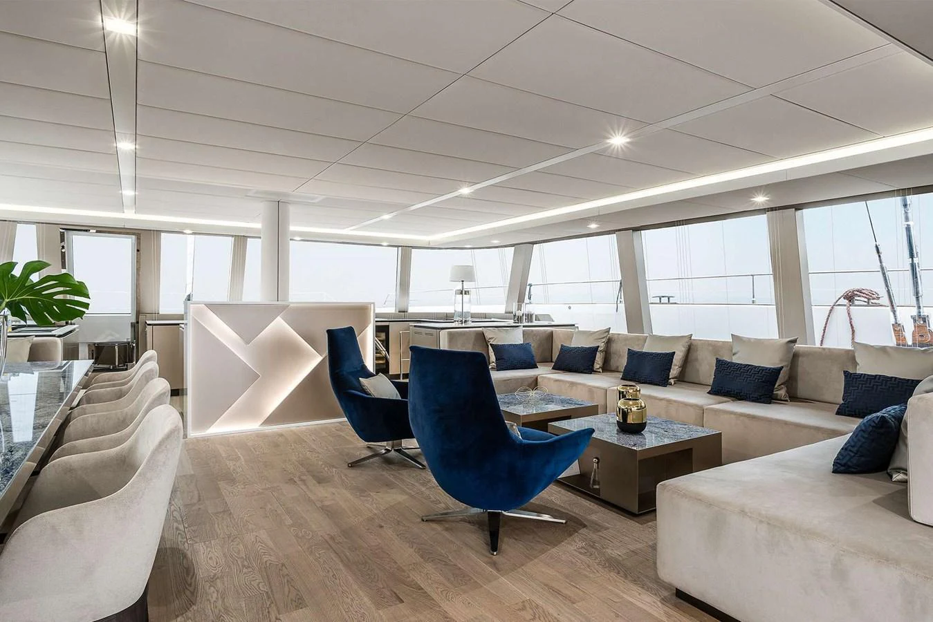The salon offers a spacious and modern seating area with elegant furnishings and ample natural light. aboard SUNREEF 80 NEXT Yacht for Sale