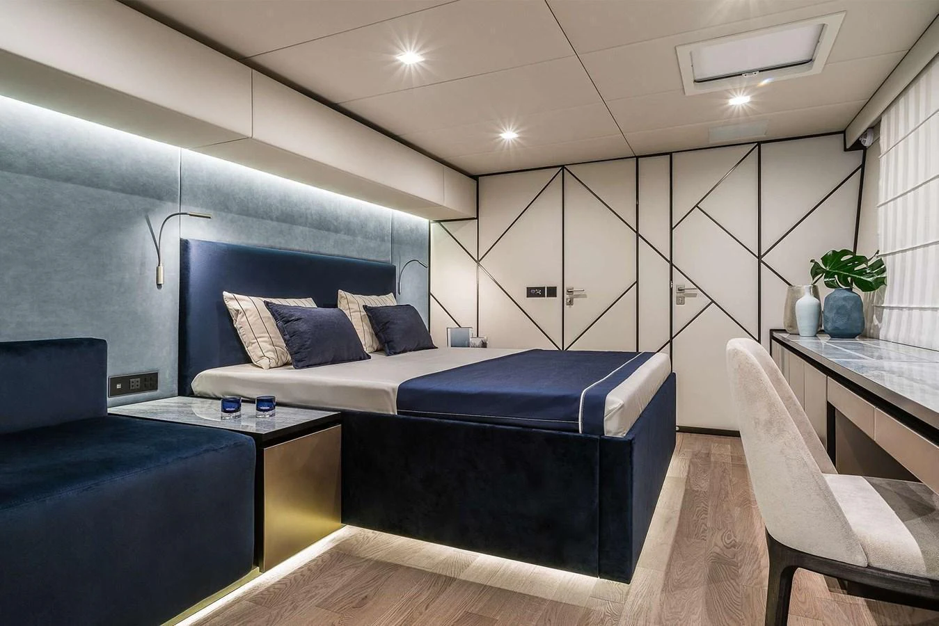 A luxurious stateroom featuring a modern design with elegant furnishings. aboard SUNREEF 80 NEXT Yacht for Sale