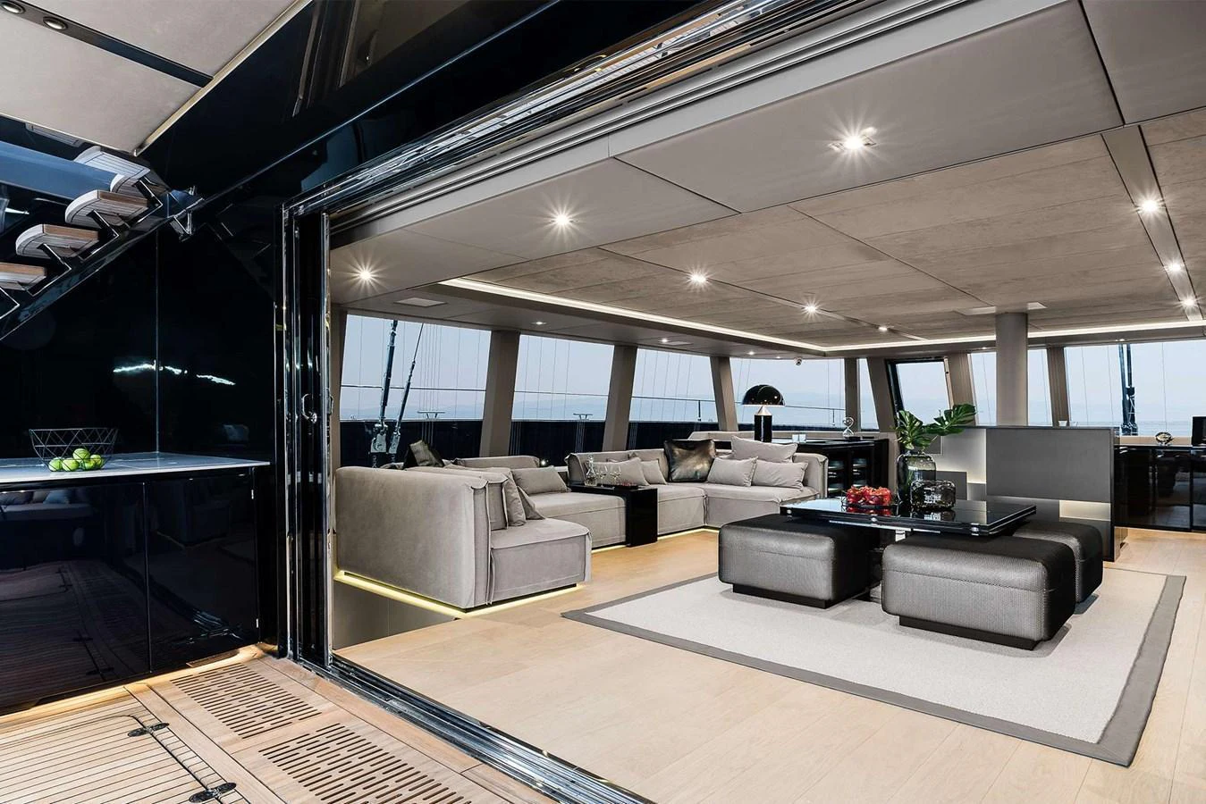 The yacht's salon features elegant seating and modern decor with ample natural light. aboard SUNREEF 80 NEXT Yacht for Sale