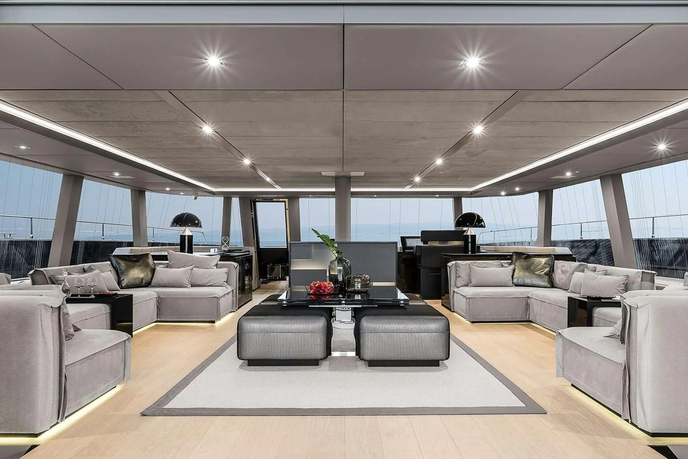 The spacious salon features modern furnishings and ample seating, creating a luxurious and inviting atmosphere. aboard SUNREEF 80 NEXT Yacht for Sale
