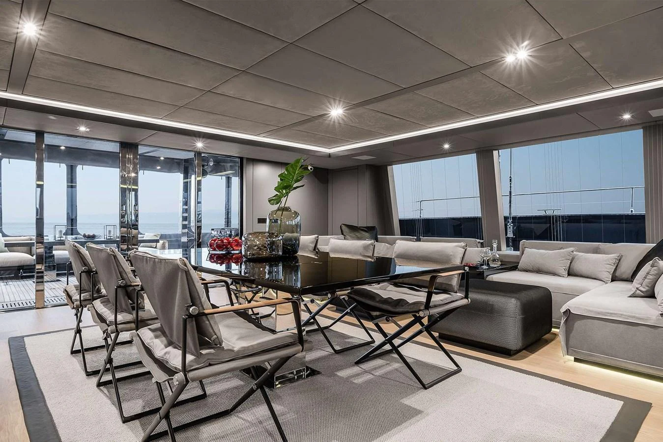 The salon offers a spacious and modern seating area with elegant furnishings and panoramic views. aboard SUNREEF 80 NEXT Yacht for Sale