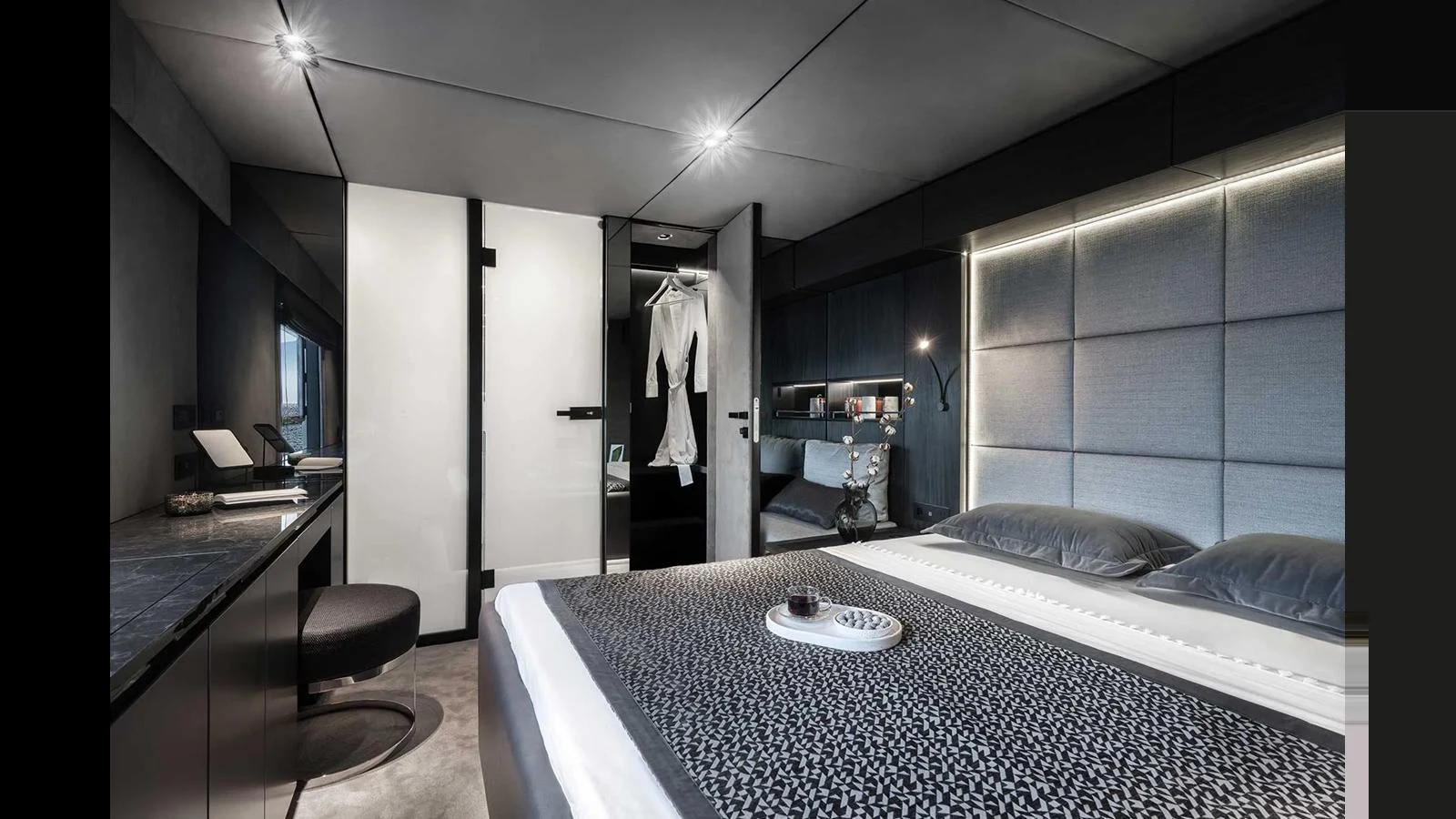A luxurious stateroom featuring a modern design with sleek furnishings and ambient lighting. aboard 70 SUNREEF POWER NEXT Yacht for Sale
