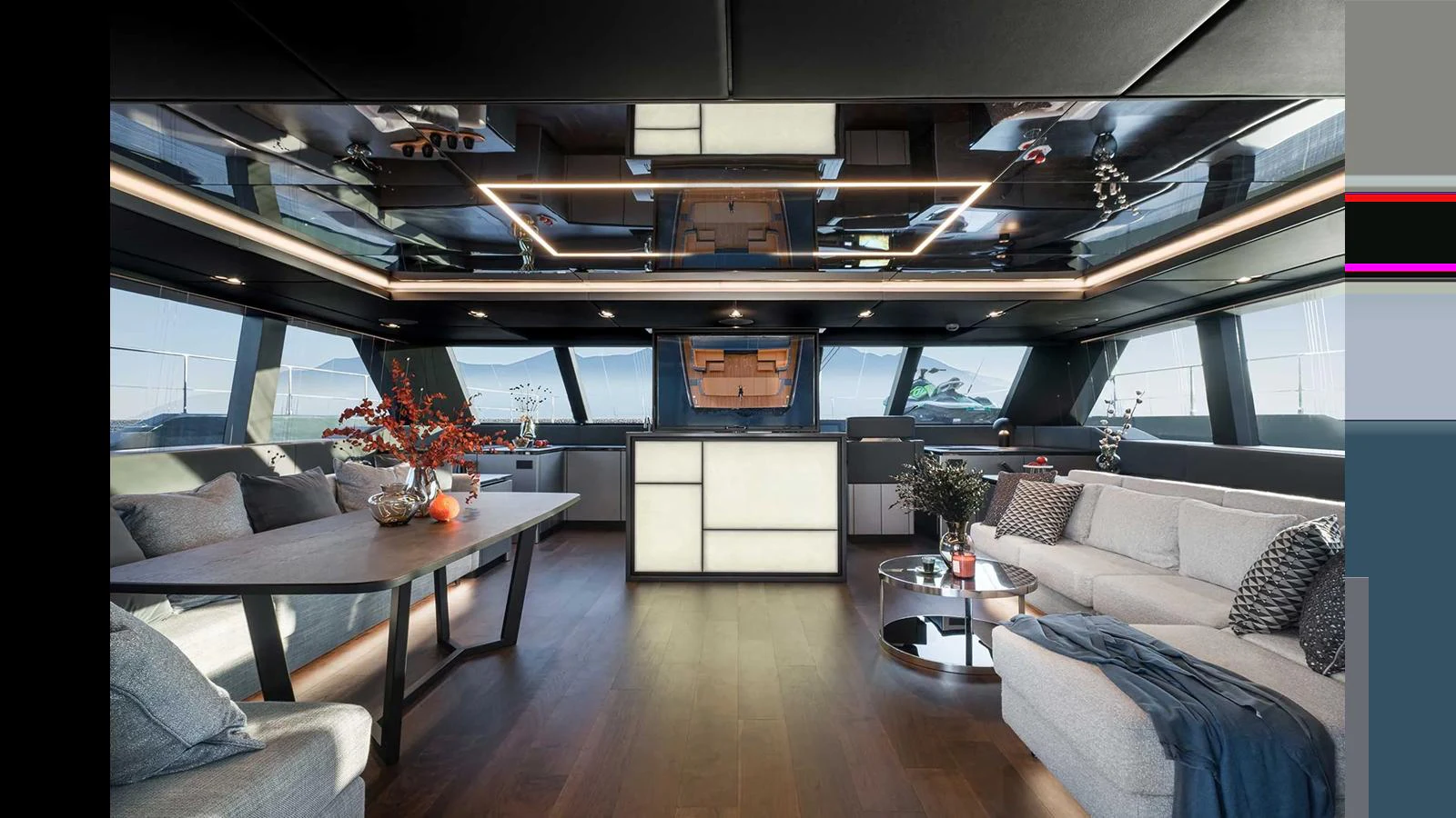 The yacht's salon features modern furnishings with ample natural light and a sophisticated ambiance. aboard 70 SUNREEF POWER NEXT Yacht for Sale