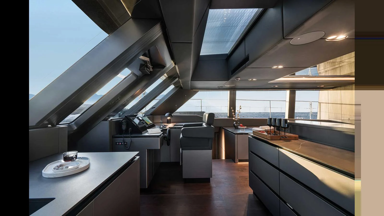 The yacht's helm features sleek, modern design with ample natural light. aboard 70 SUNREEF POWER NEXT Yacht for Sale
