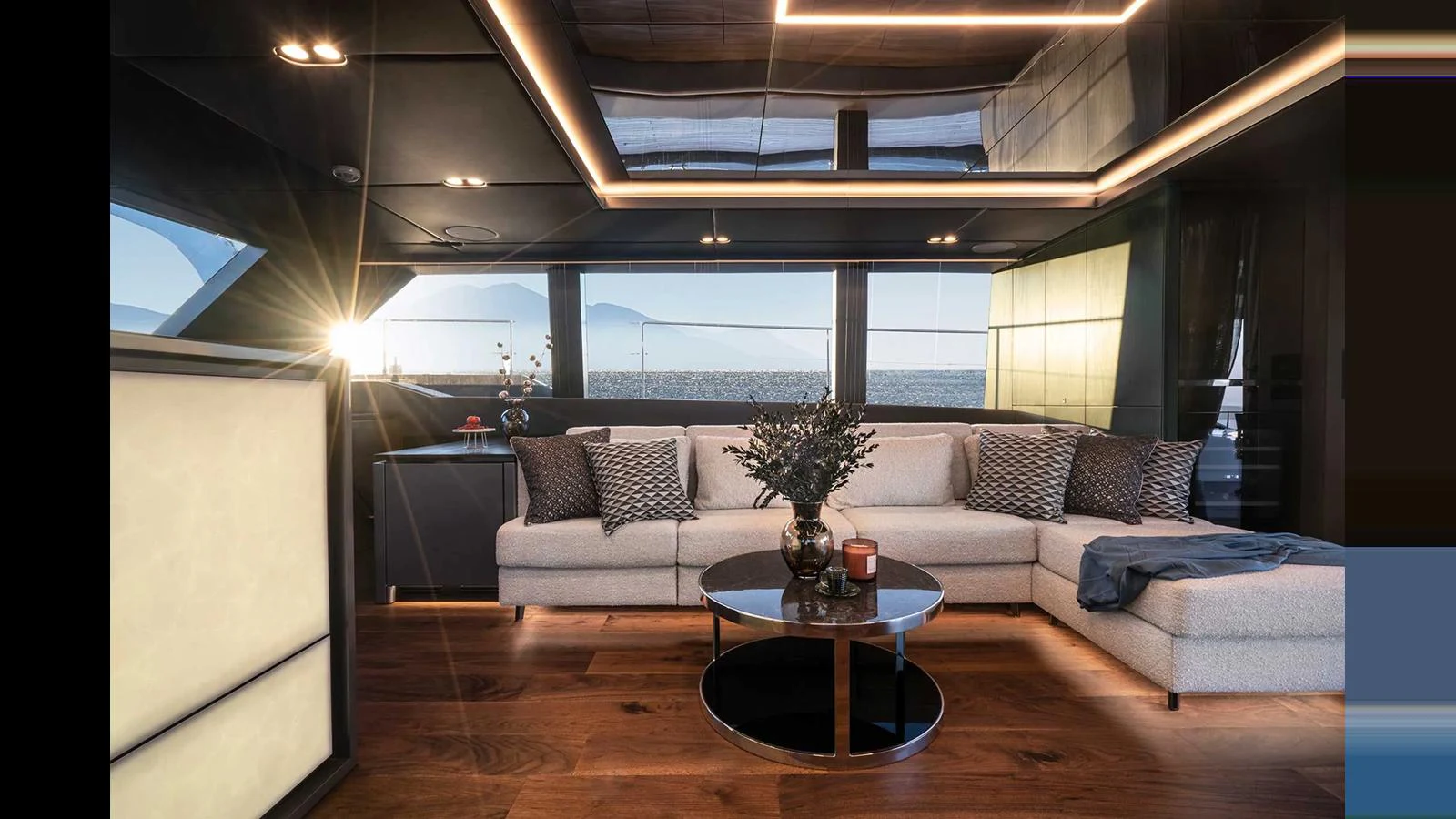 The salon features a luxurious seating area with modern decor and ample natural light. aboard 70 SUNREEF POWER NEXT Yacht for Sale