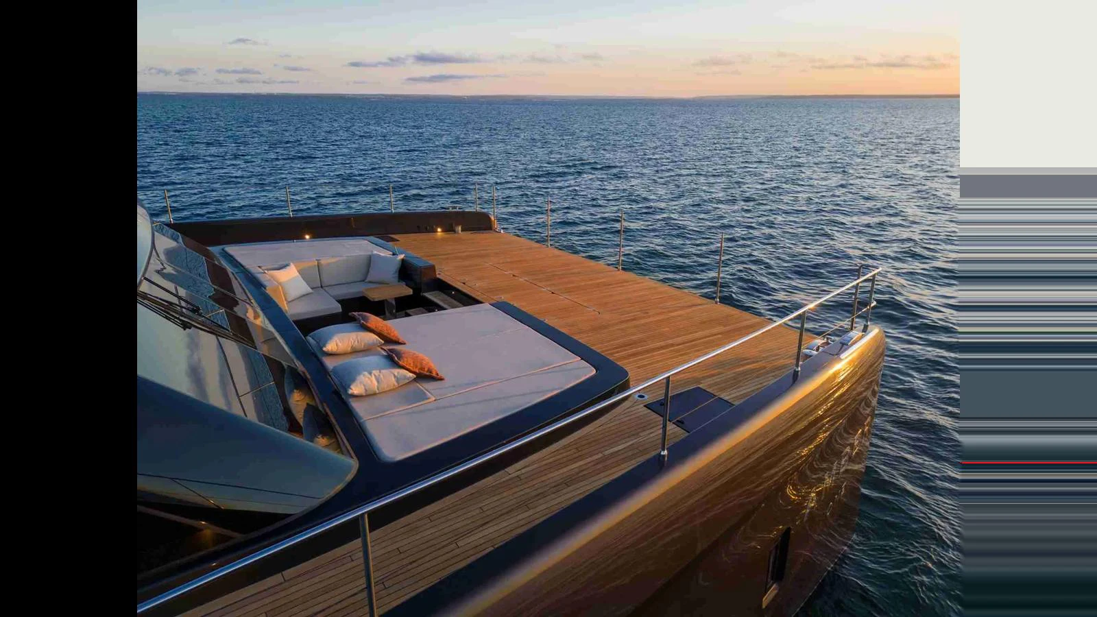The yacht's aft deck offers a luxurious lounging area with plush cushions, perfect for enjoying the sunset over the open sea. aboard 70 SUNREEF POWER NEXT Yacht for Sale