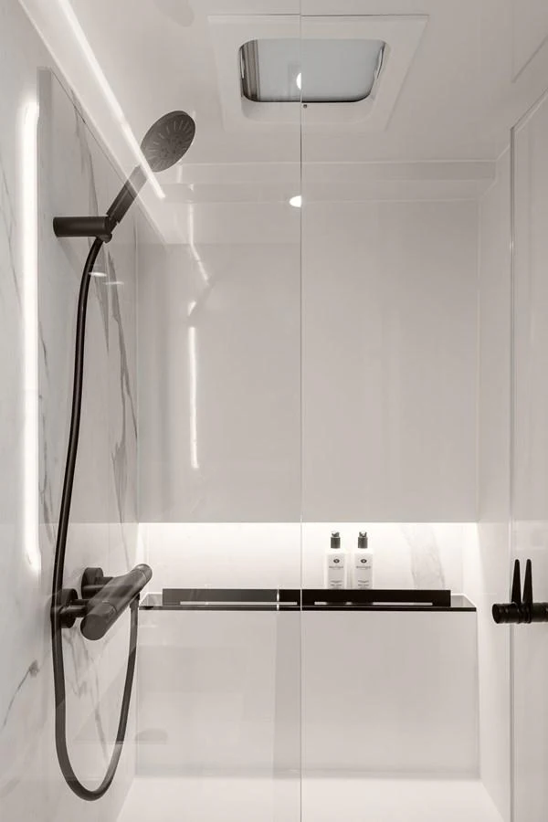 A sleek and modern yacht bathroom with a minimalist design. aboard SUNREEF 70 NEXT Yacht for Sale