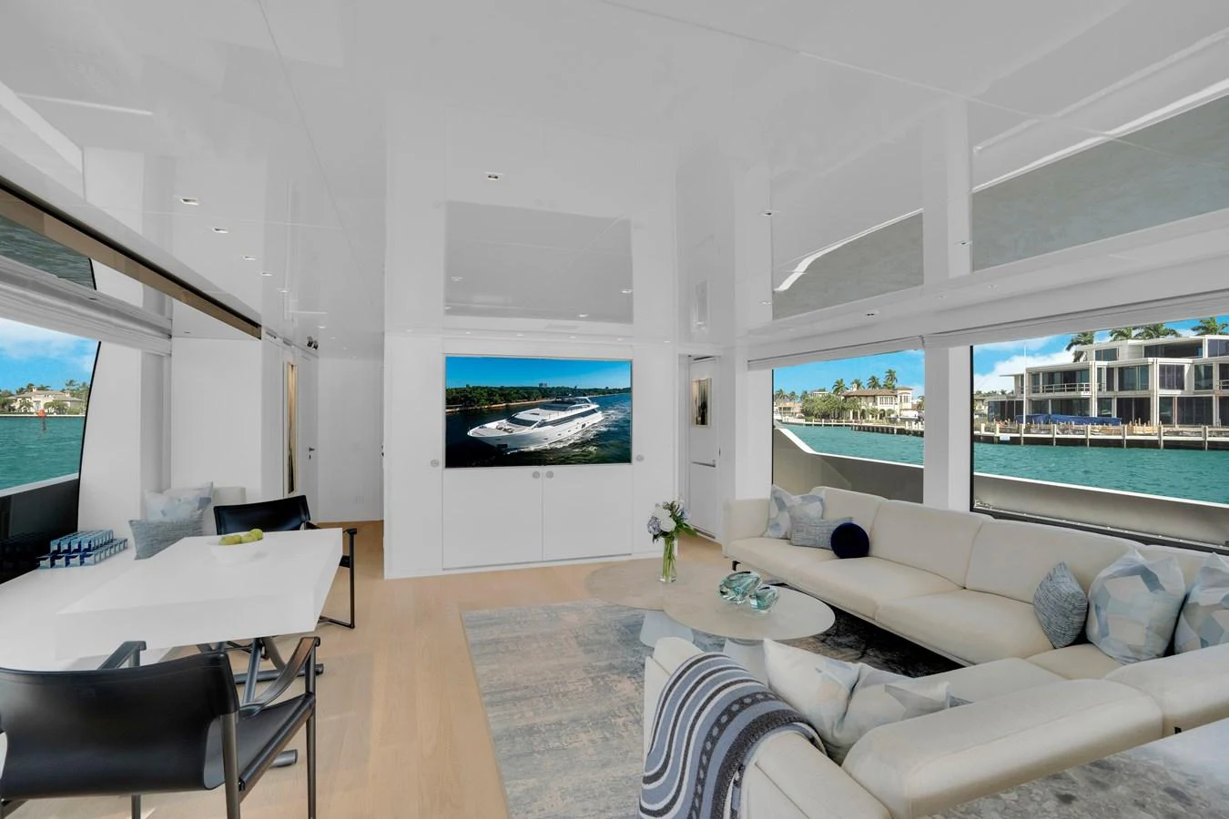 a living room with a large window aboard SWEET VIRGINIA Yacht for Sale