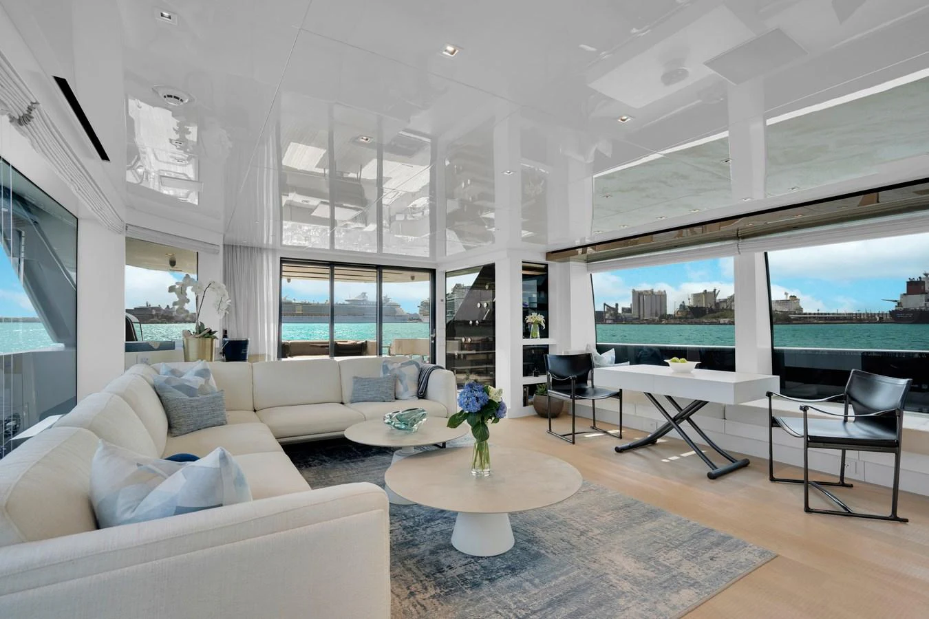 a living room with a large window aboard SWEET VIRGINIA Yacht for Sale