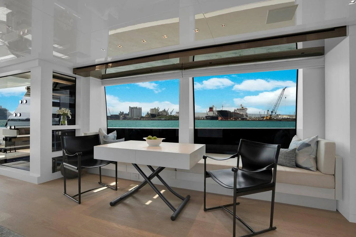 a room with a table and chairs aboard SWEET VIRGINIA Yacht for Sale