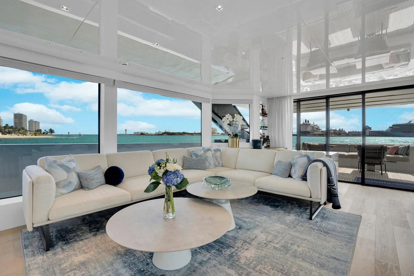 a living room with a large window aboard SWEET VIRGINIA Yacht for Sale