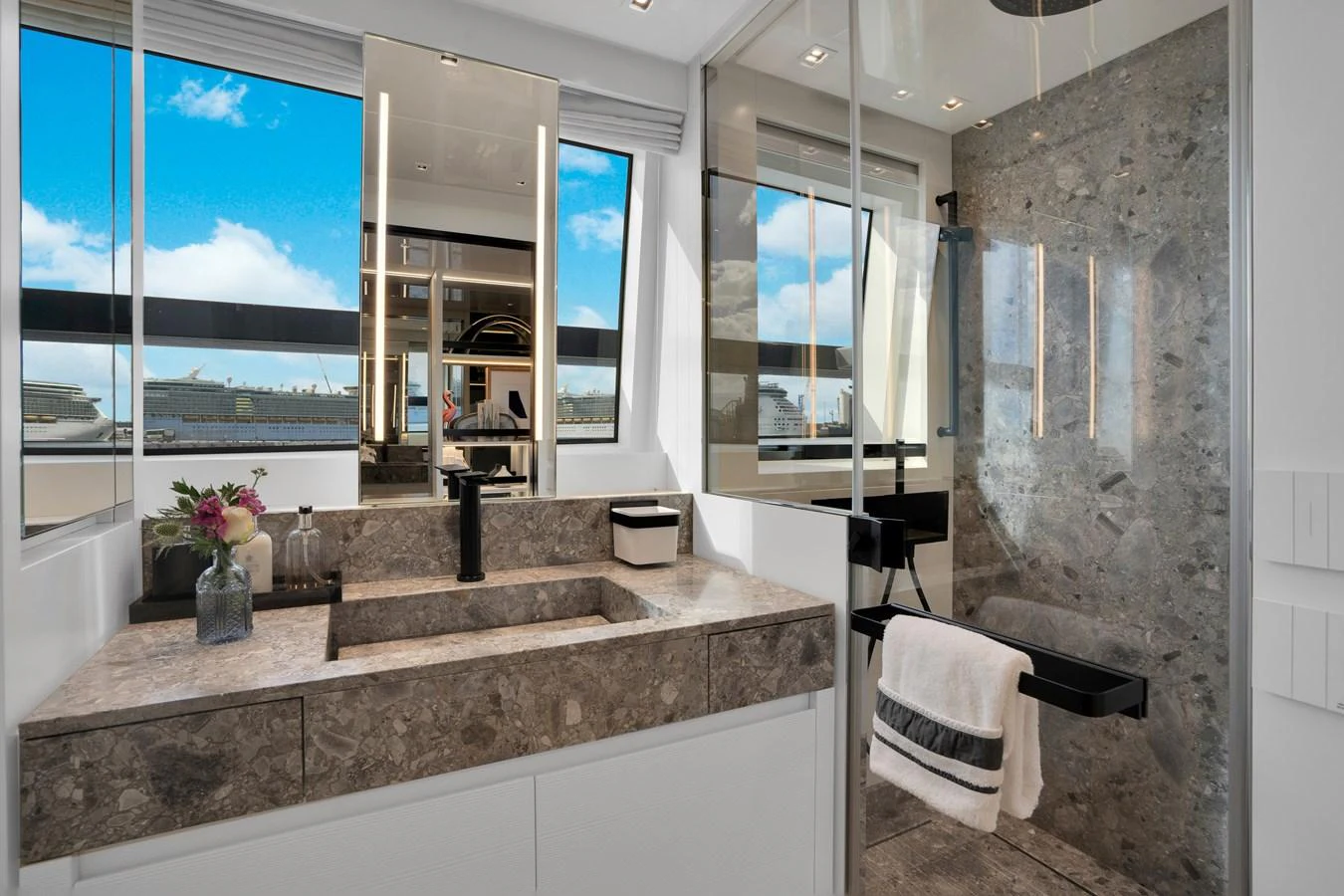 a bathroom with a large marble counter aboard SWEET VIRGINIA Yacht for Sale