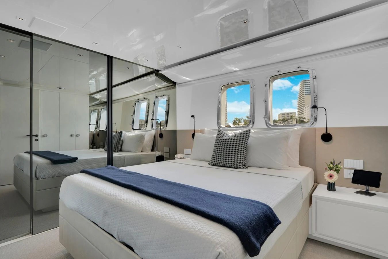 a room with a bed and a window aboard SWEET VIRGINIA Yacht for Sale