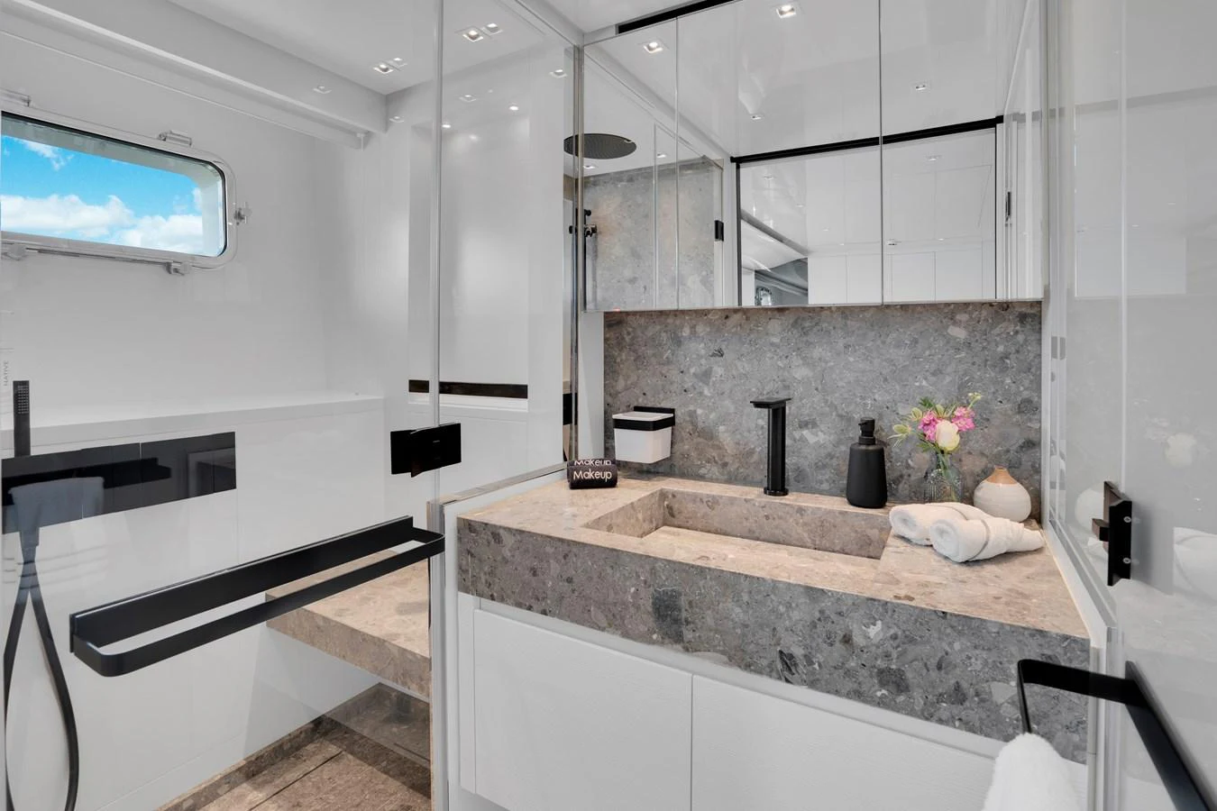 a bathroom with a marble counter top aboard SWEET VIRGINIA Yacht for Sale