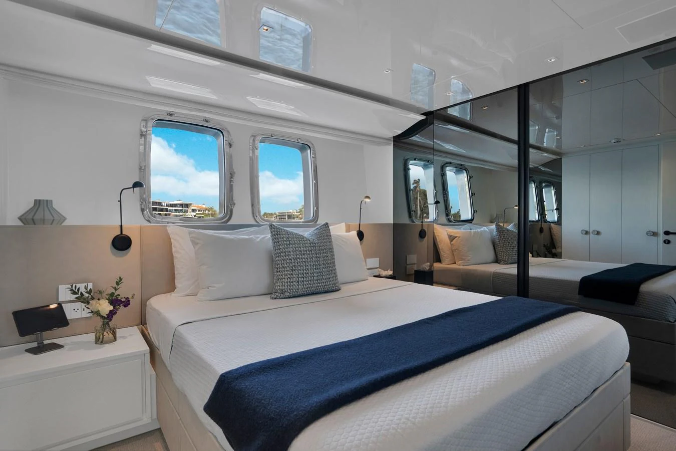 a room with a bed and a window aboard SWEET VIRGINIA Yacht for Sale