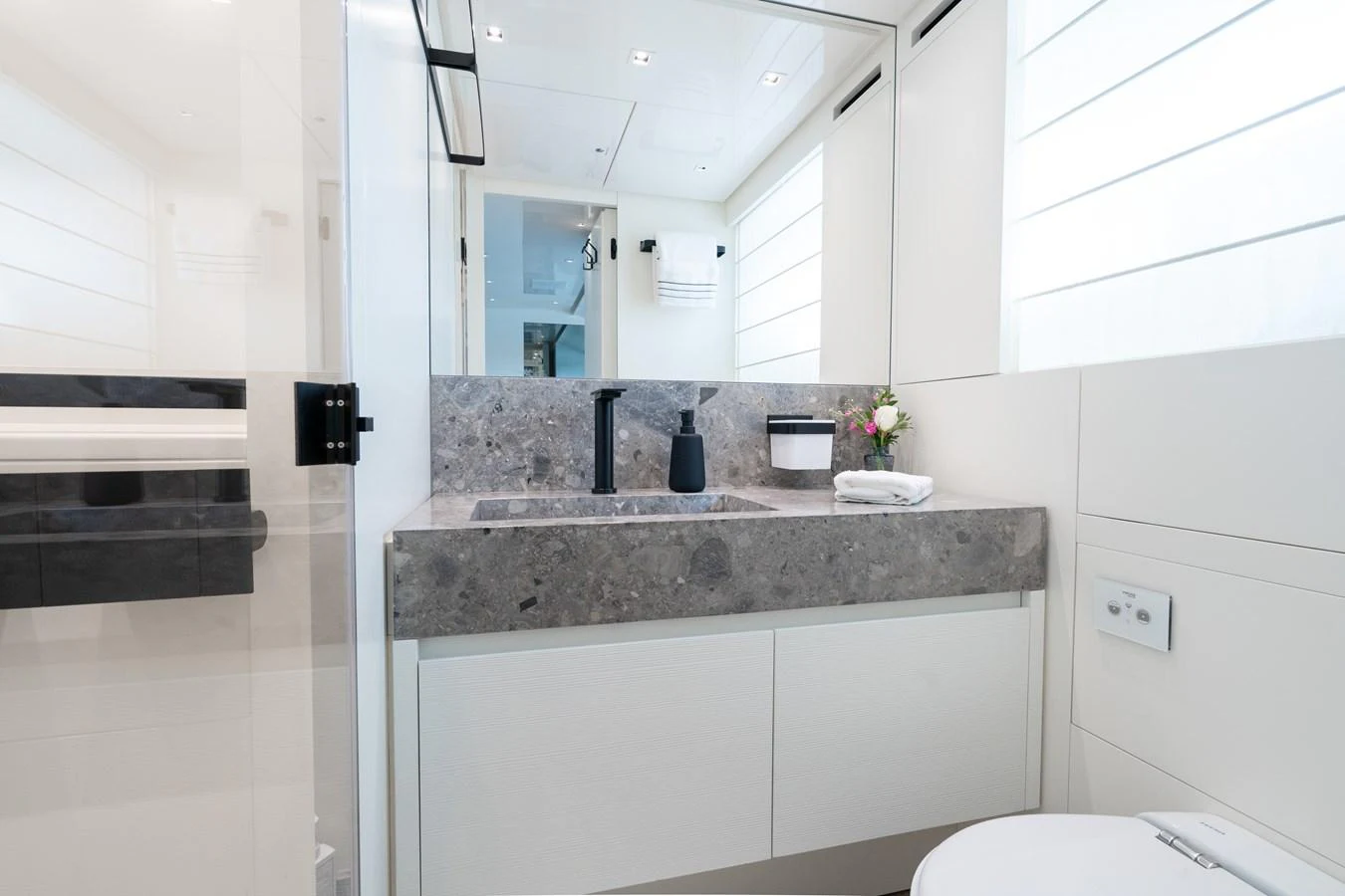 a bathroom with a marble counter top aboard SWEET VIRGINIA Yacht for Sale