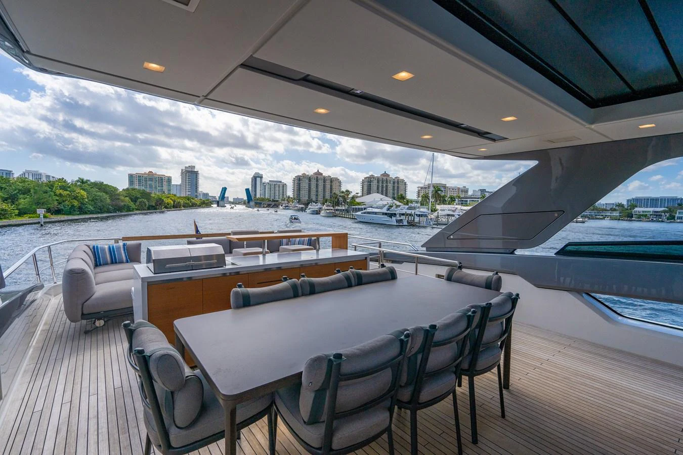 a table and chairs on a deck aboard SWEET VIRGINIA Yacht for Sale