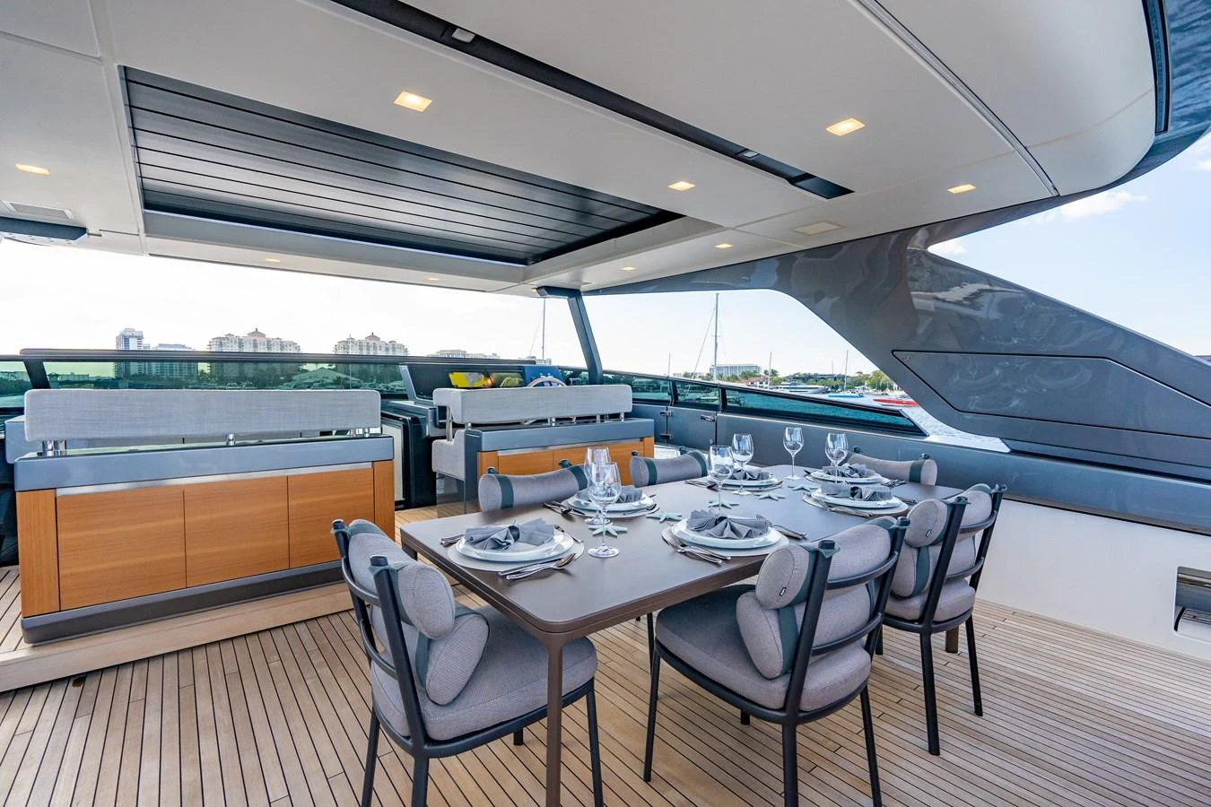 a kitchen with a table and chairs aboard SWEET VIRGINIA Yacht for Sale