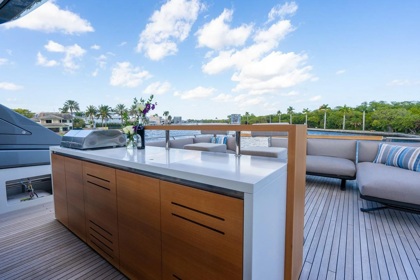 a large open area with a large deck and a large deck with a view of the water and aboard SWEET VIRGINIA Yacht for Sale