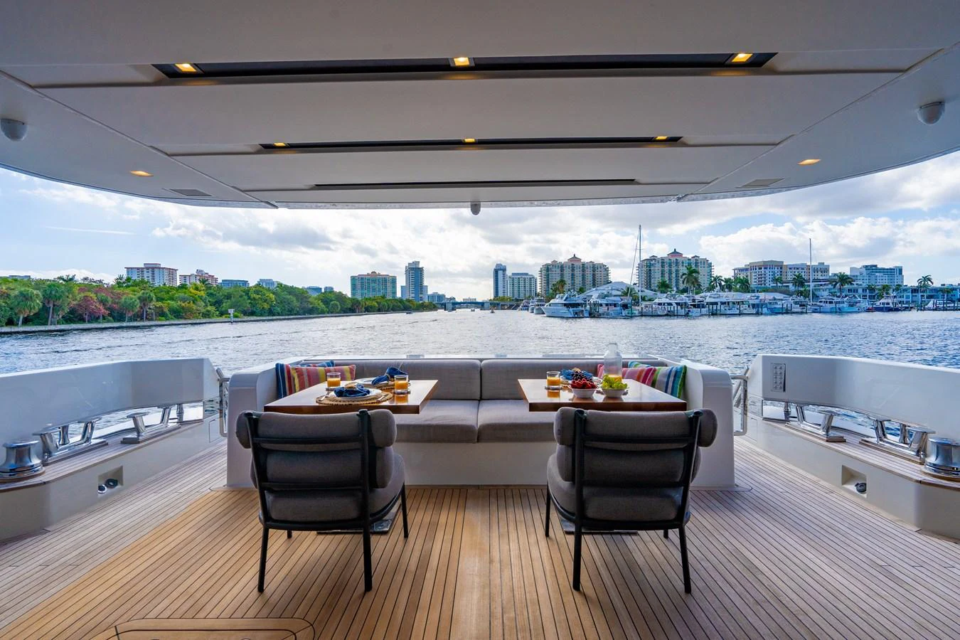 a room with a table and chairs aboard SWEET VIRGINIA Yacht for Sale