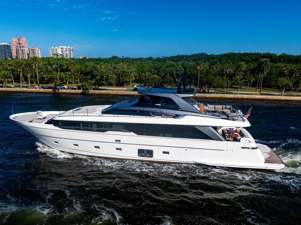a white yacht on a beach aboard SWEET VIRGINIA Yacht for Sale