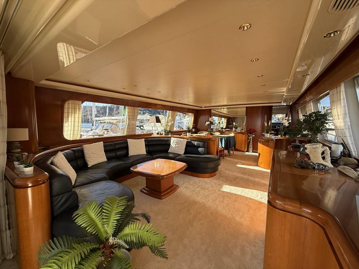 The spacious salon features elegant furnishings and ample natural light. aboard SIKOY Yacht for Sale