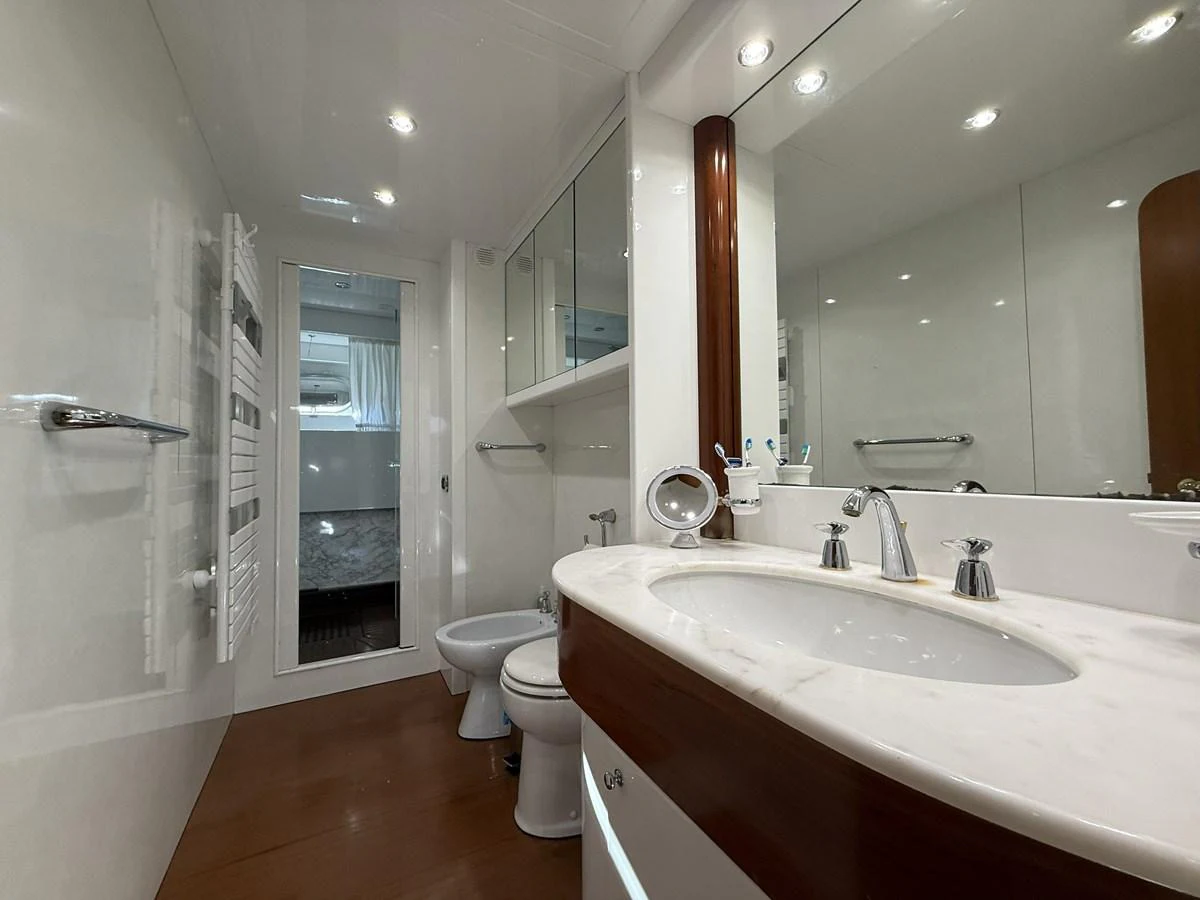 The yacht's bathroom features elegant fixtures and a spacious layout. aboard SIKOY Yacht for Sale