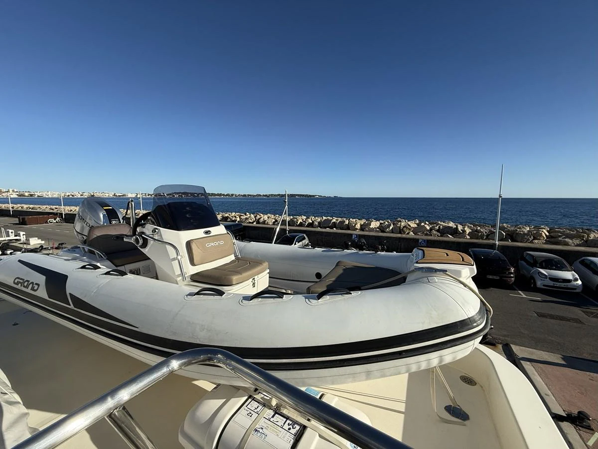 A sleek tender is positioned on the deck, ready for excursions. aboard SIKOY Yacht for Sale