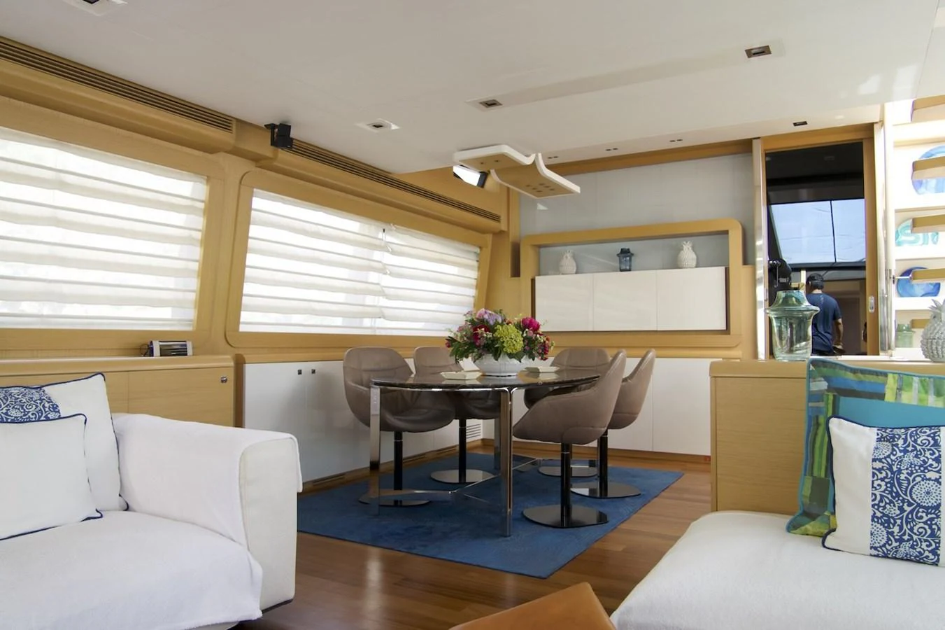 a living room with a table and chairs aboard ANTONINA Yacht for Sale