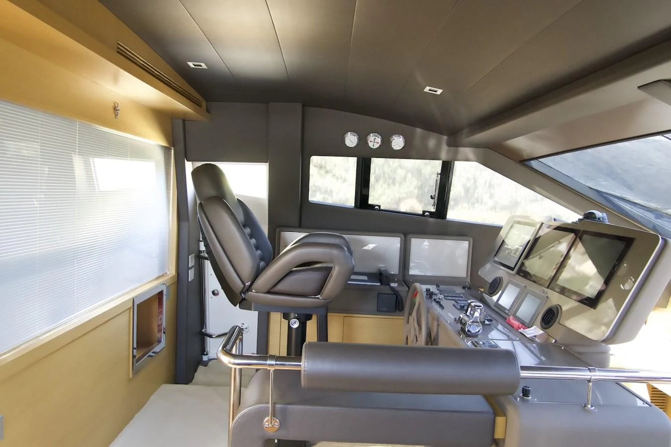 a vehicle with a desk and chairs aboard ANTONINA Yacht for Sale